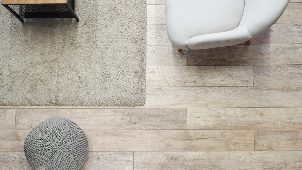 overhead view of light colored textured hardwood